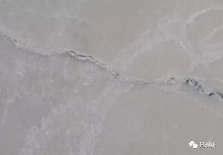 灰木纹石材返碱现象的研究与处理